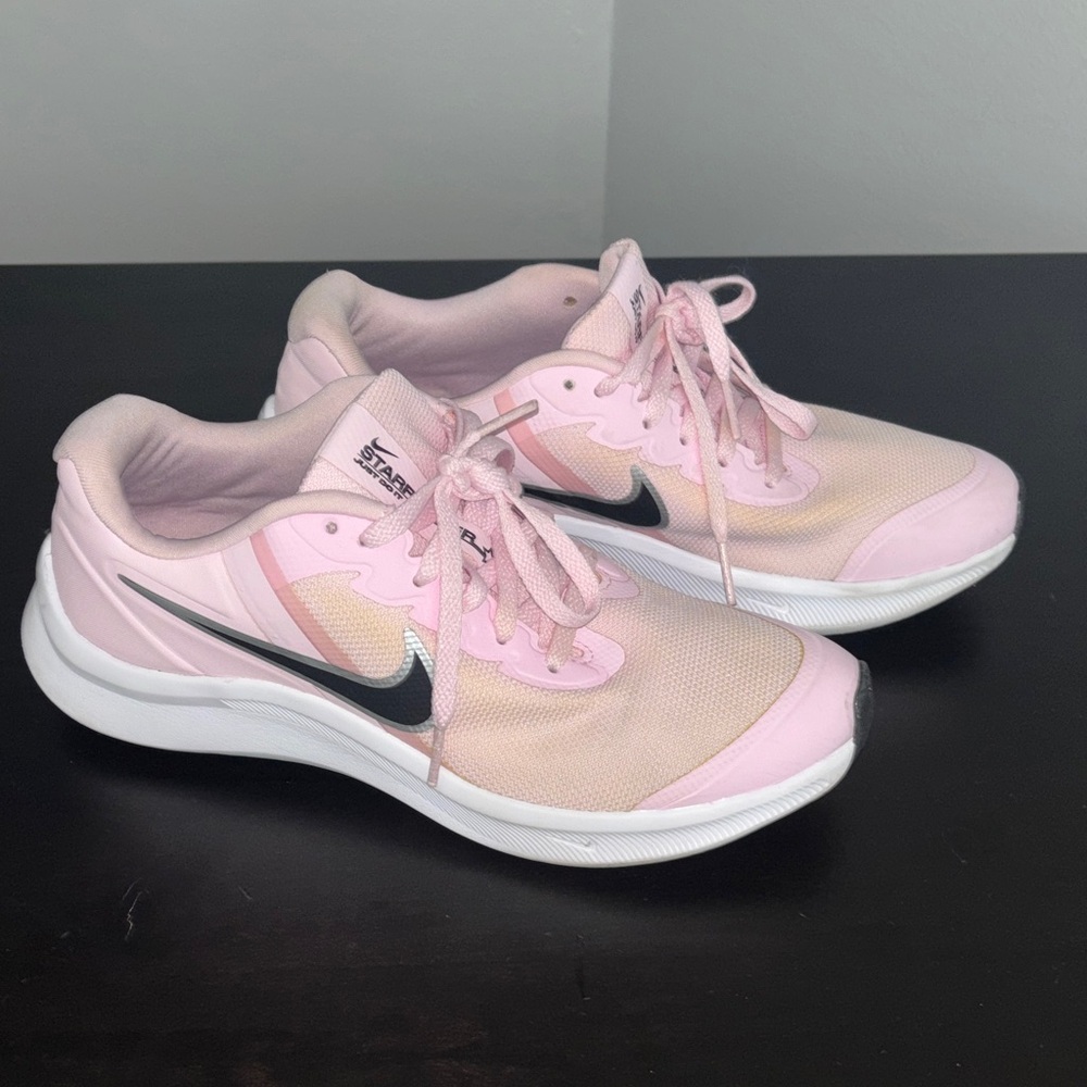 Nike Light Pink Athletic Sneakers with Black Swoosh